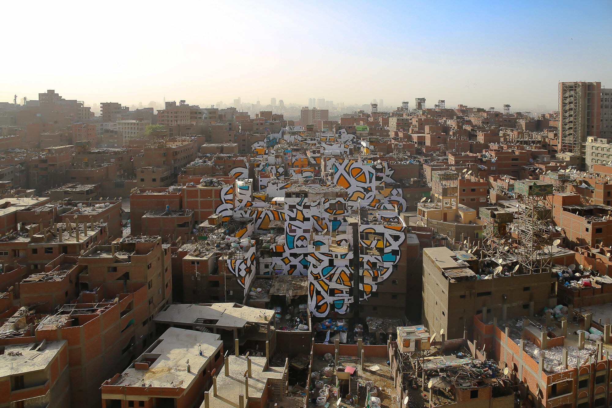 Perception — eL Seed's mural over Manshiyat Naser, Cairo
